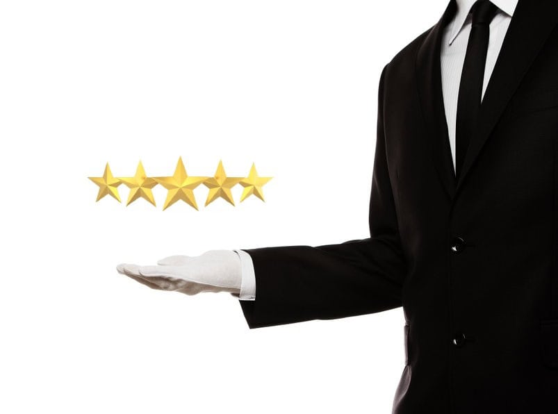 suit holding 5 stars